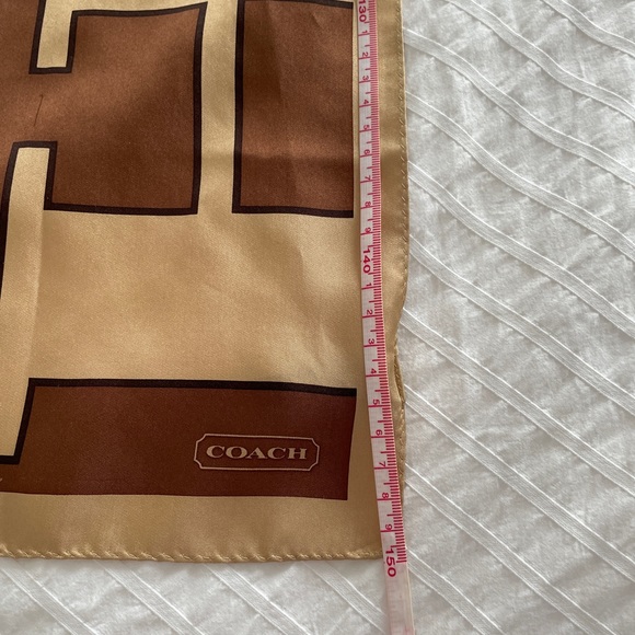 Coach silk scarf. Tan and brown logo print. Great condition. - Picture 7 of 8